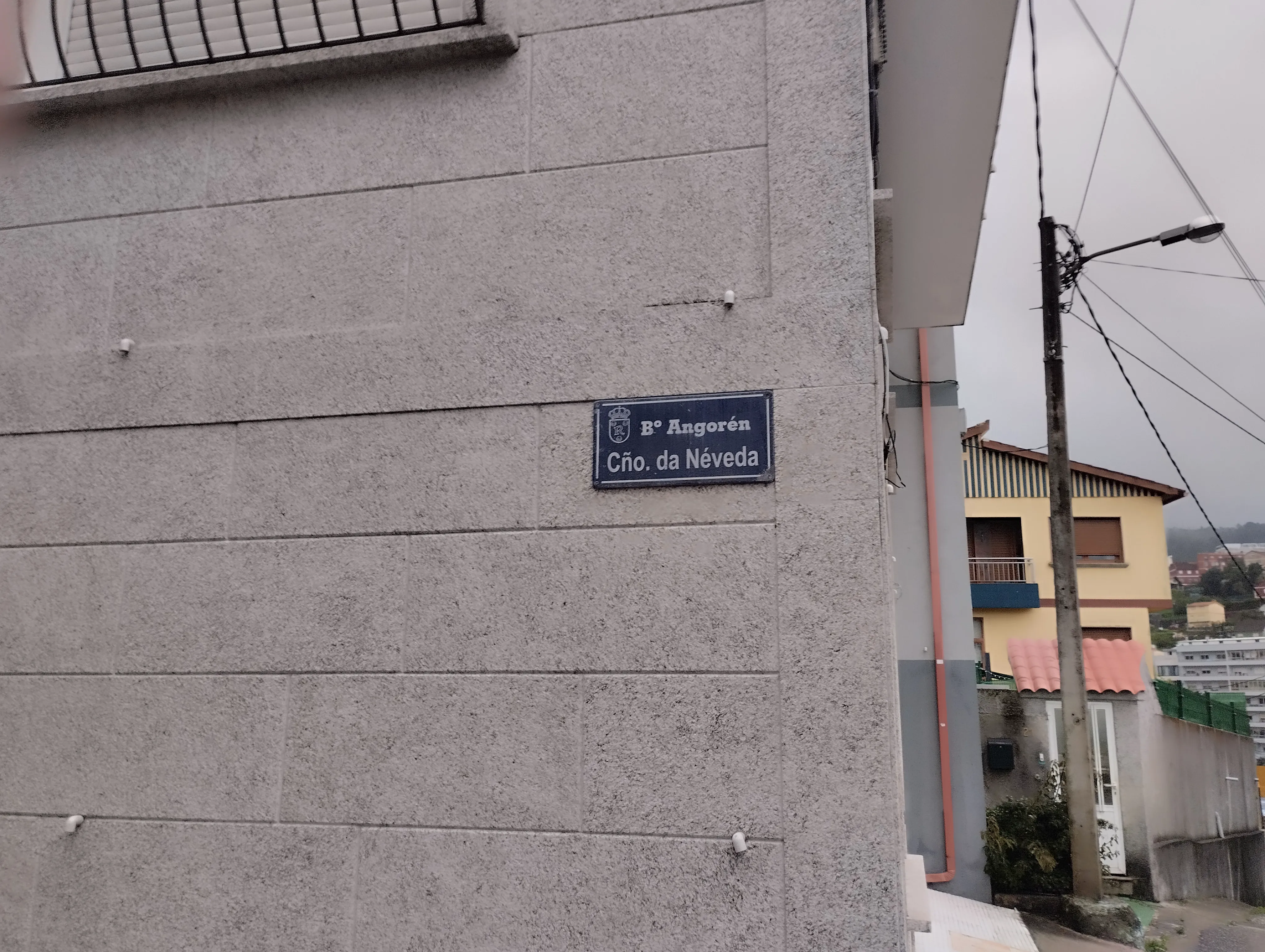 Placa con el nombre del barrio Placa con el nombre del barrio